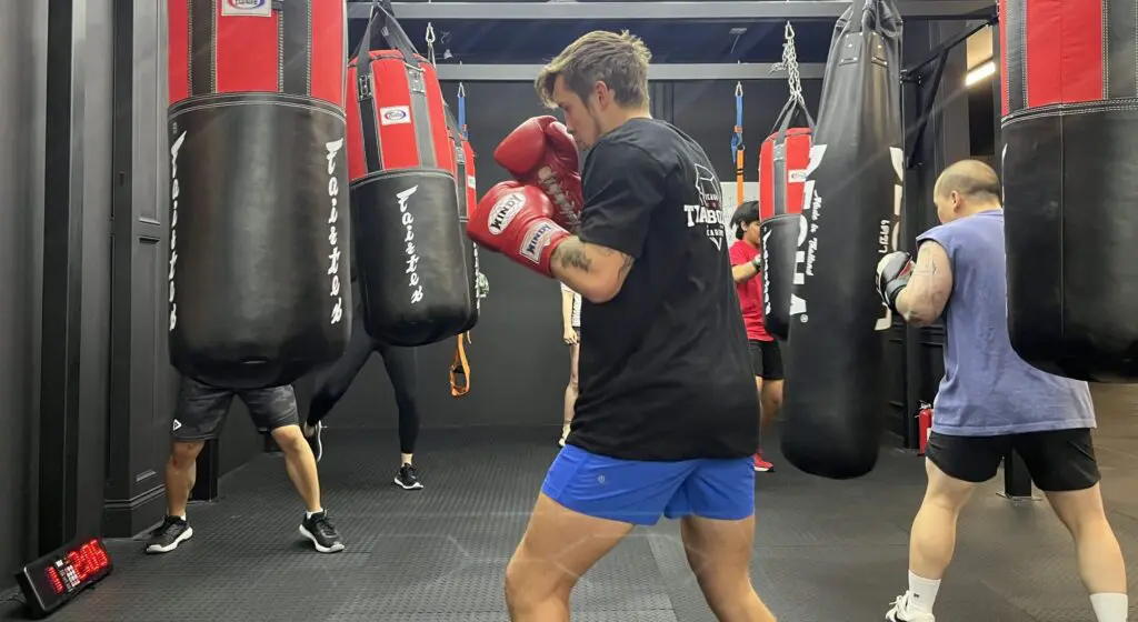 Member hitting the heavy bag at CTBA